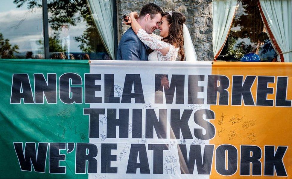 Richie and Orlagh on their wedding day with the flag