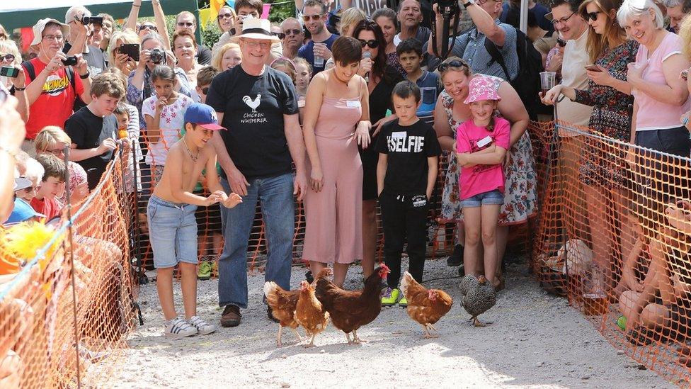 People with their chickens