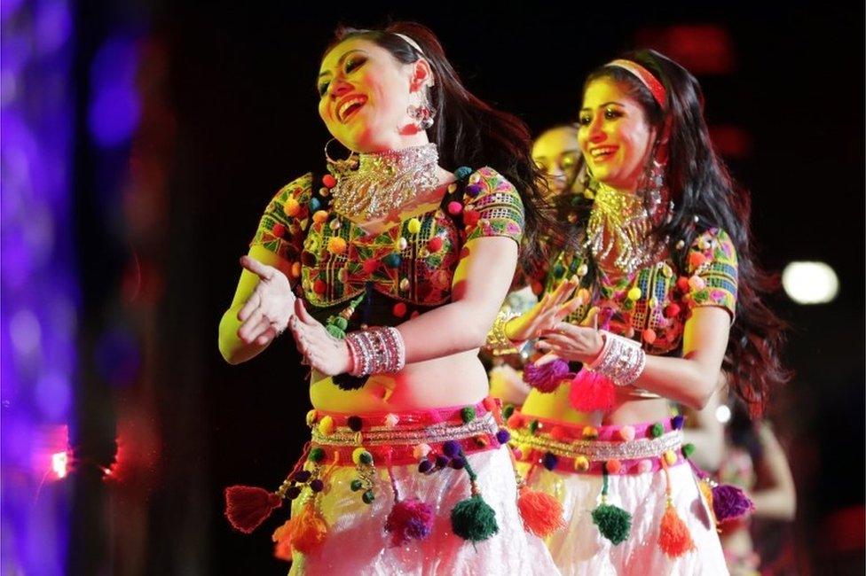 Dancers perform during a charity event hosted by the Republican Hindu Coalition, Saturday, Oct. 15, 2016, in Edison, N.J. Republican presidential candidate Donald Trump spoke during the event.