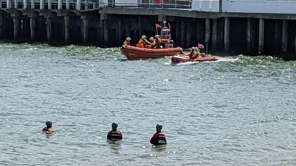 Lifeboat next to Clacton Pier searching for missing male swimmer on 19 July 2022