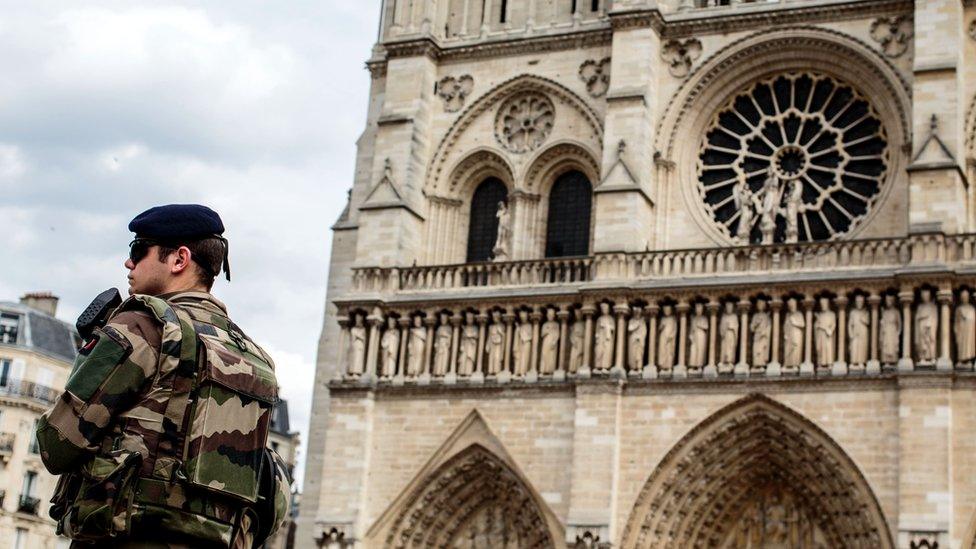 Security on the forecourt of the Notre Dame cathedral in Paris, France