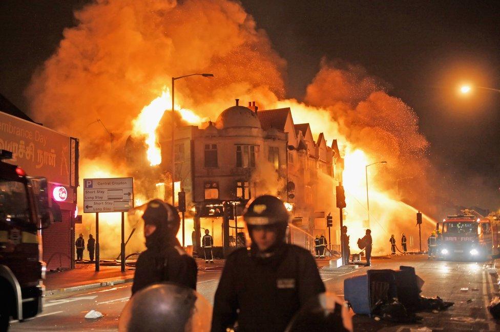 Firefighters battle a fire that broke out in Croydon, south London, on 9 August 2011