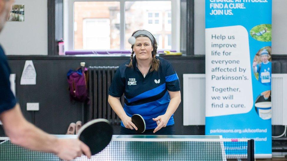 Leona playing table tennis