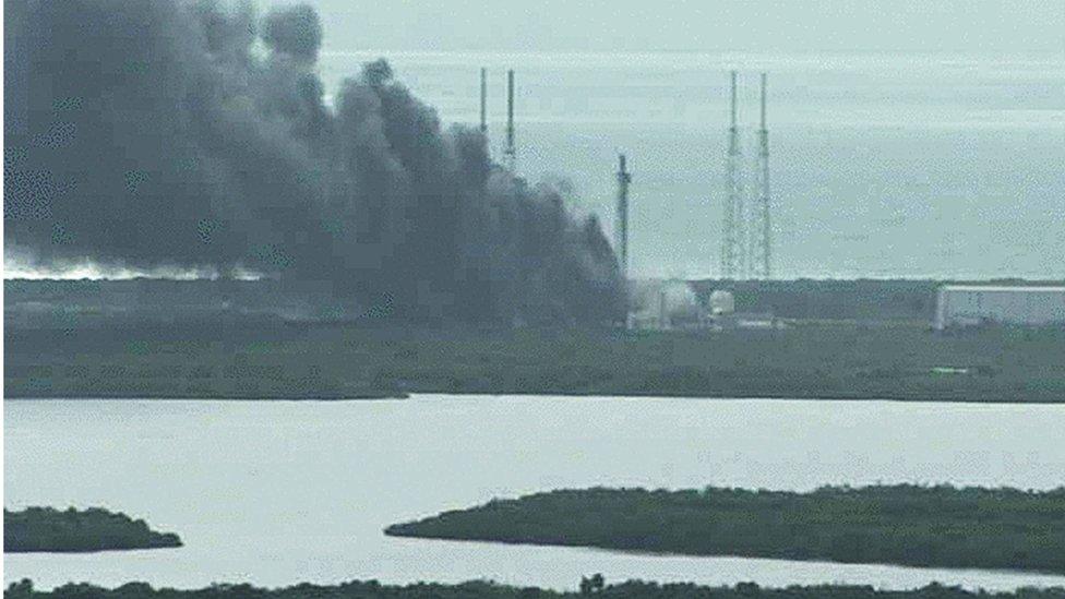 A handout image from a NASA live camera shows a fire burning on a launch pad after reports indicated that a SpaceX Falcon 9 rocket, which was scheduled to launch on 3 September, exploded during a test firing in Cape Canaveral, Florida, USA