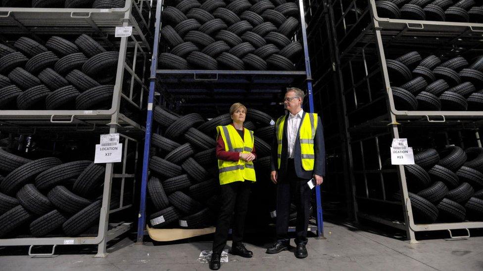 Nicola Sturgeon with Michelin factory manager John Reid in June 2017