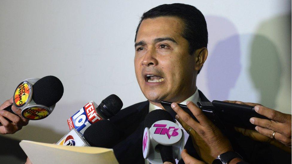 Juan Antonio Hernandez speaks with the press upon arrival at the Toncontin international airport from the United States, on October 25, 2016 in Tegucigalpa