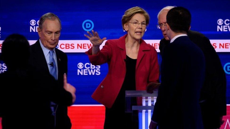 Michael Bloomberg (left) and Elizabeth Warren (centre) after the debate in Charleston, South Carolina. Photo: 25 February 2020