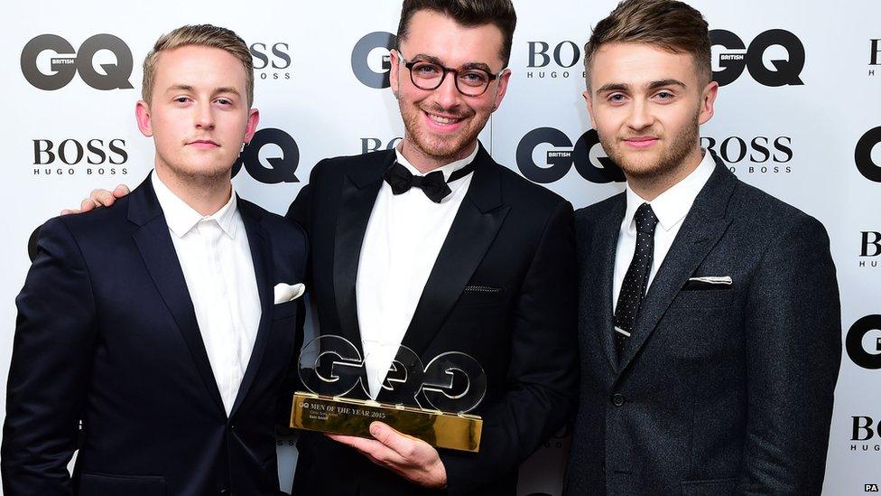 Guy and Howard Lawrence present Sam Smith with the Ciroc Solo Artist Award at the 2015 GQ Men of the Year Awards