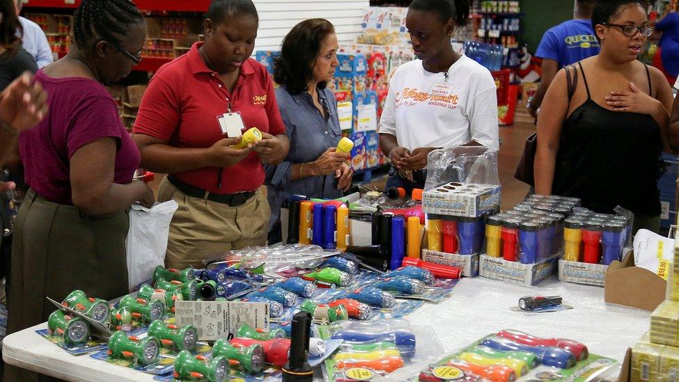 Shoppers buying torches