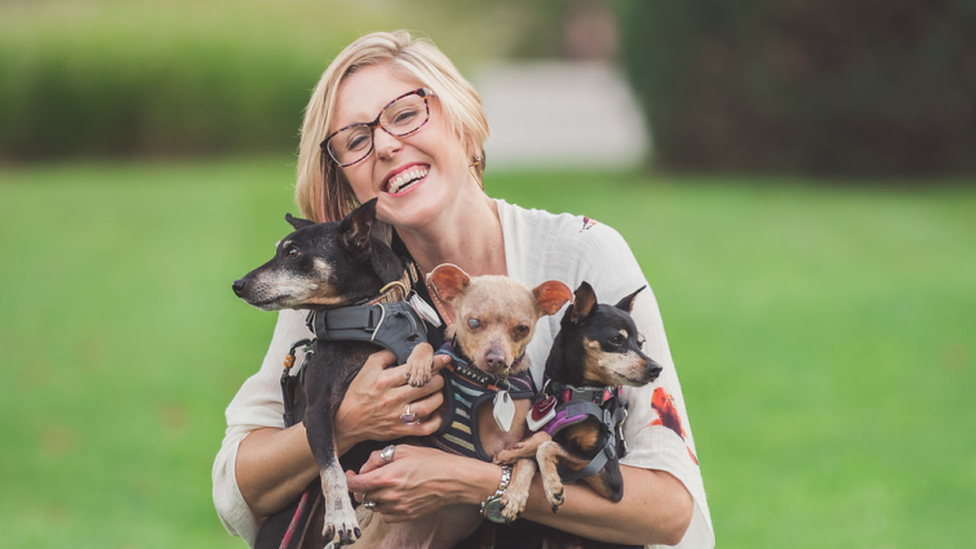 Colleen Krajewski and her pet dogs