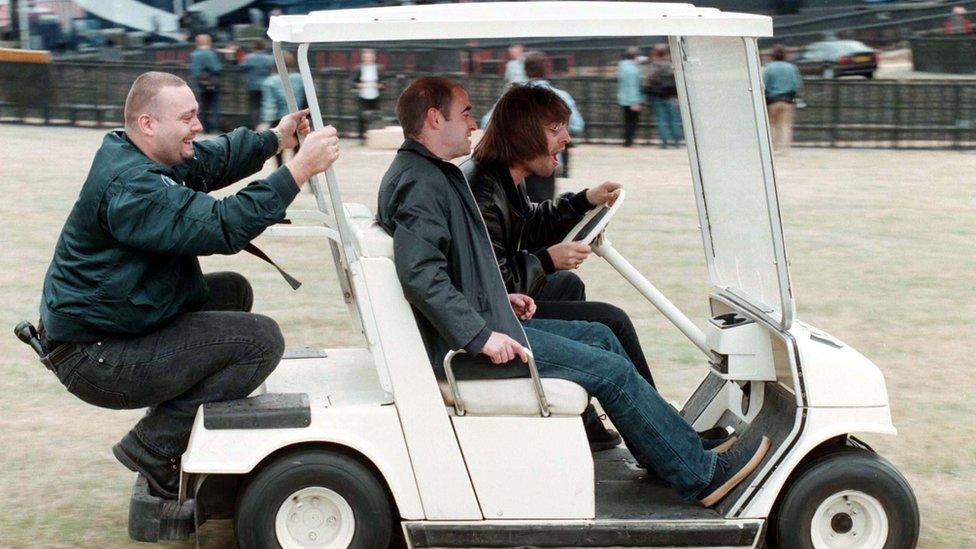 Oasis in a golf buggy