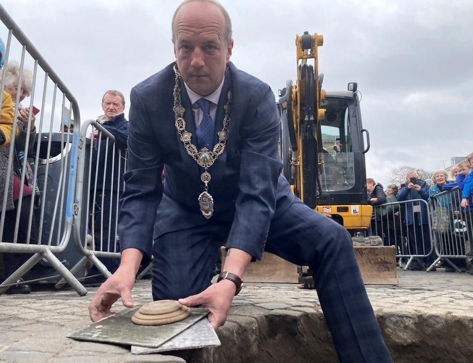 Kelso provost Gavin Horsburgh retrieves items from the time capsule