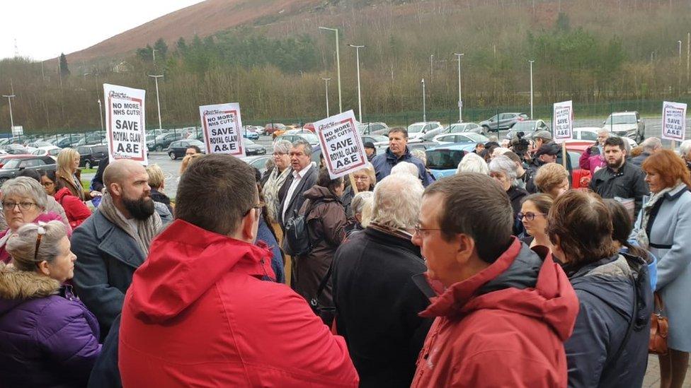 Protesters gathered outside the health board meeting on Thursday