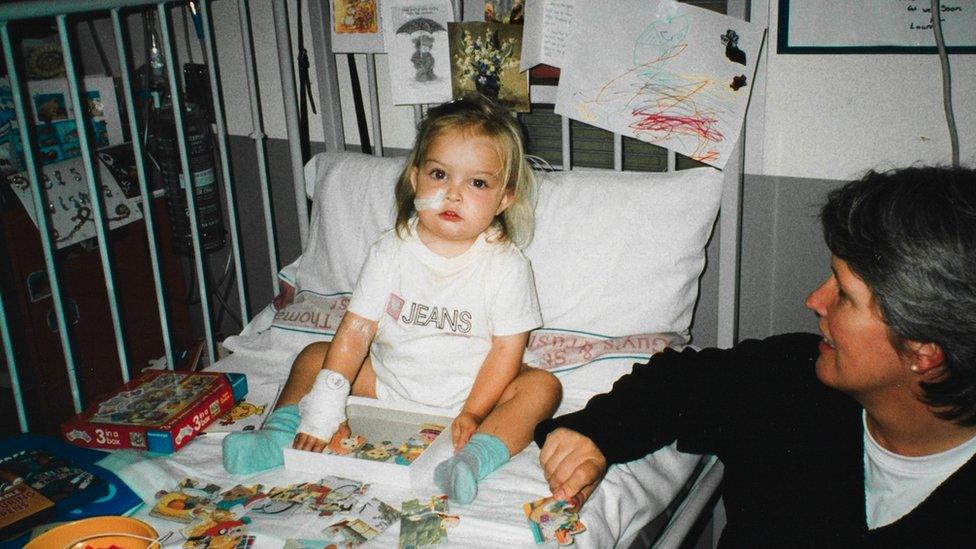 Image of Hattie as a child. She is pictured in hospital.