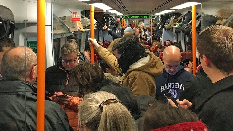 Commuters on a crowded train