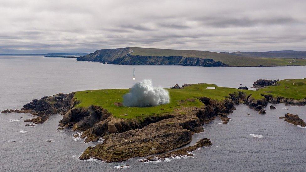 Computer generated image of SaxaVord UK spaceport of a rocket taking off from Lamba Ness in Unst