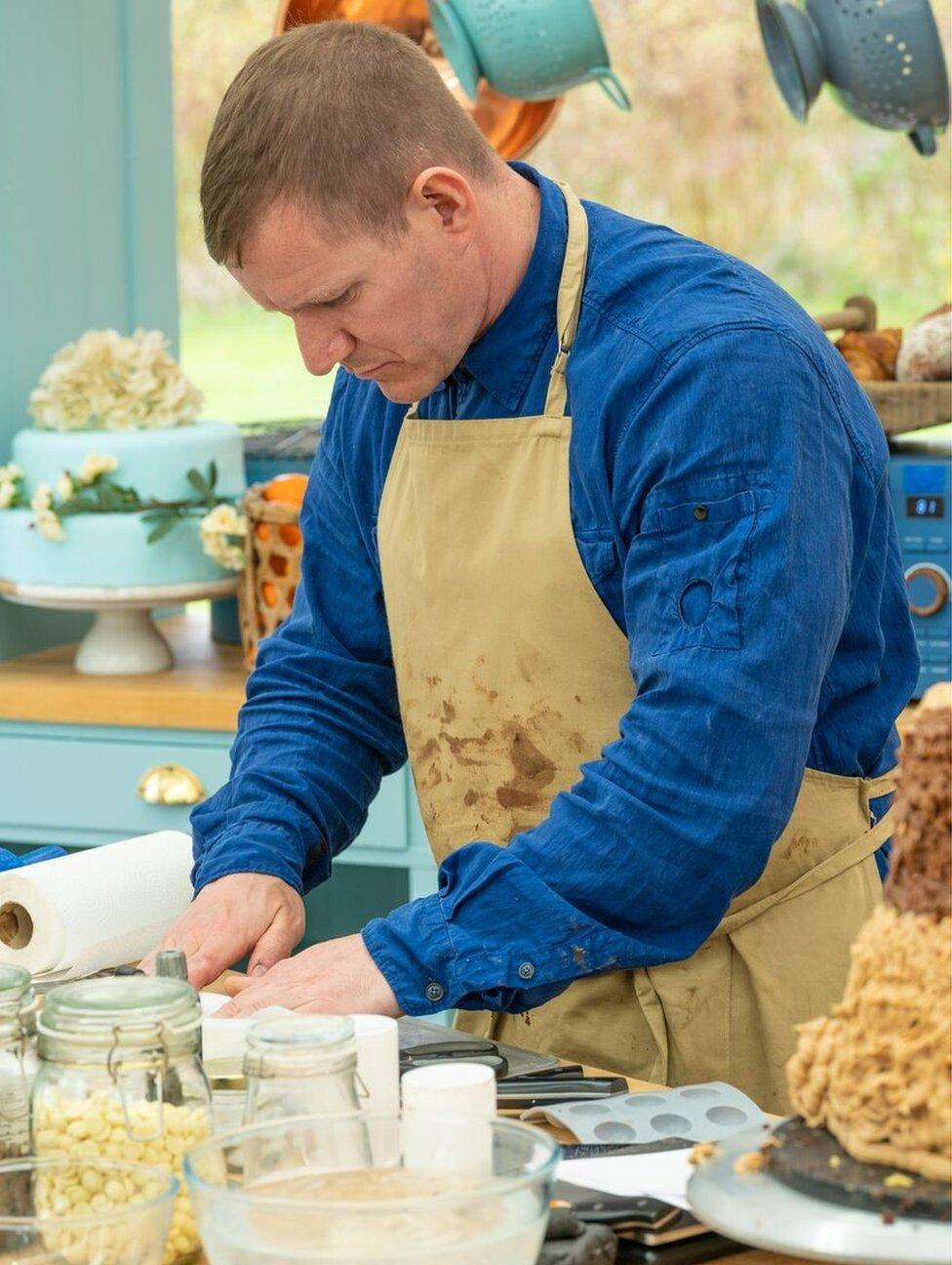 New Bake Off contestant Dan in action