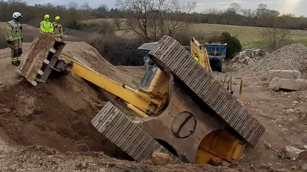 Overturned digger