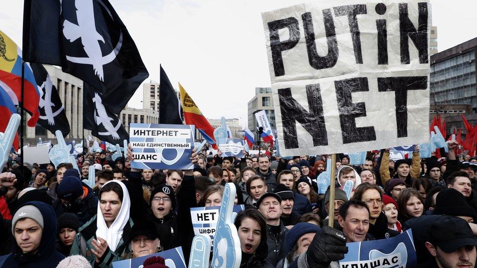 People attend an opposition rally in Moscow, Russia 10 March 2019