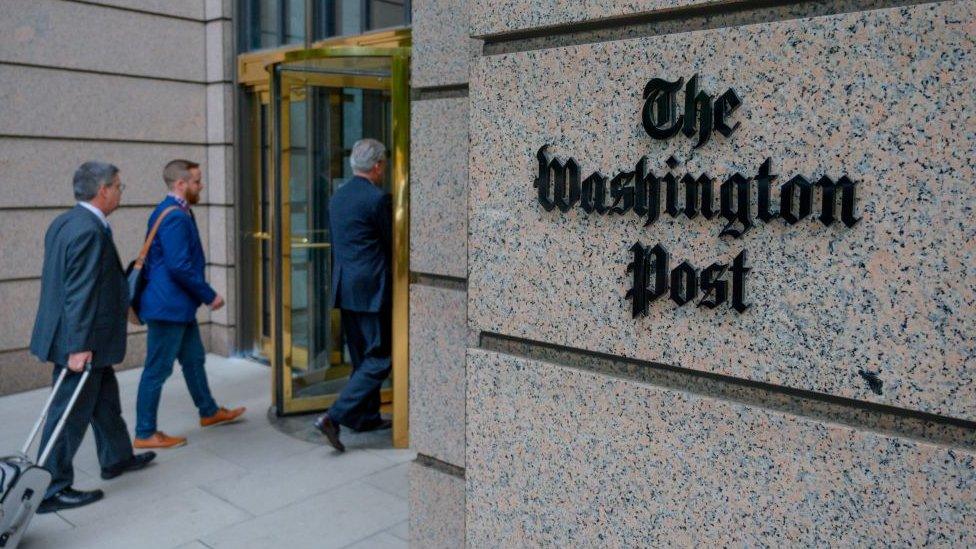 The Washington post logo emblazoned on their building in Washington DC