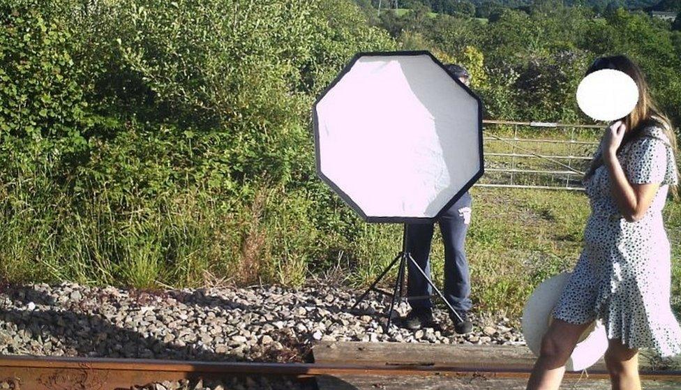 Photos being taken on a railway track