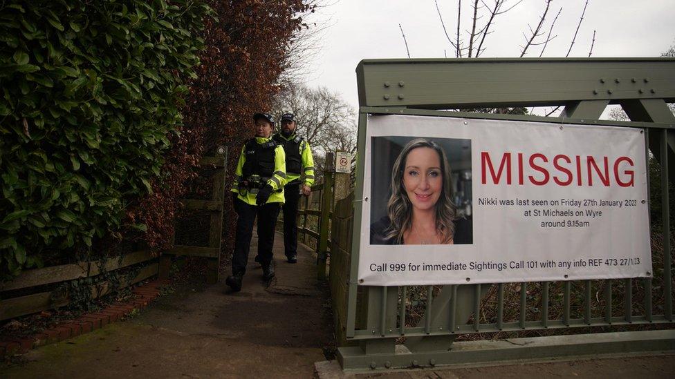 A poster for Nicola Bulley on a footbridge over the River Wyre