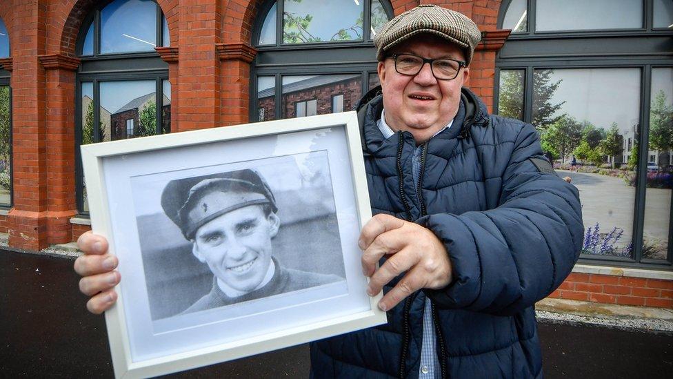 John Warmisham with a picture of Stan Mellor