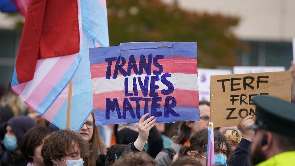 Trans rights protestors counter-protest a Let Women Speak rally in Belfast