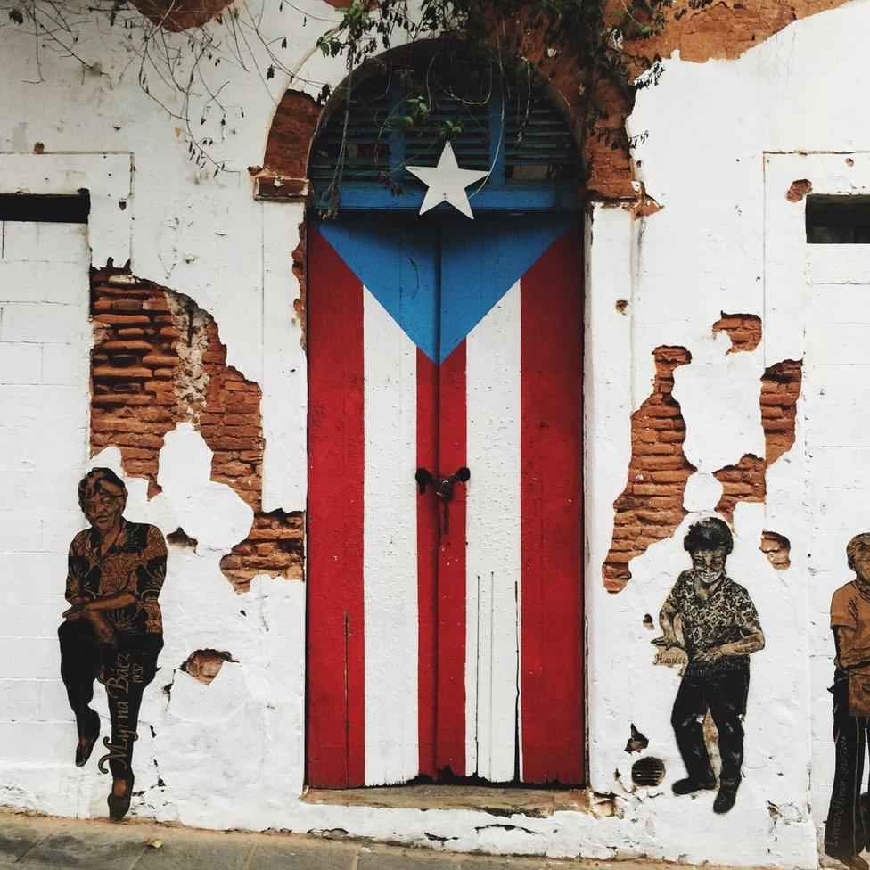 A door painted to look like the Puerto Rican flag