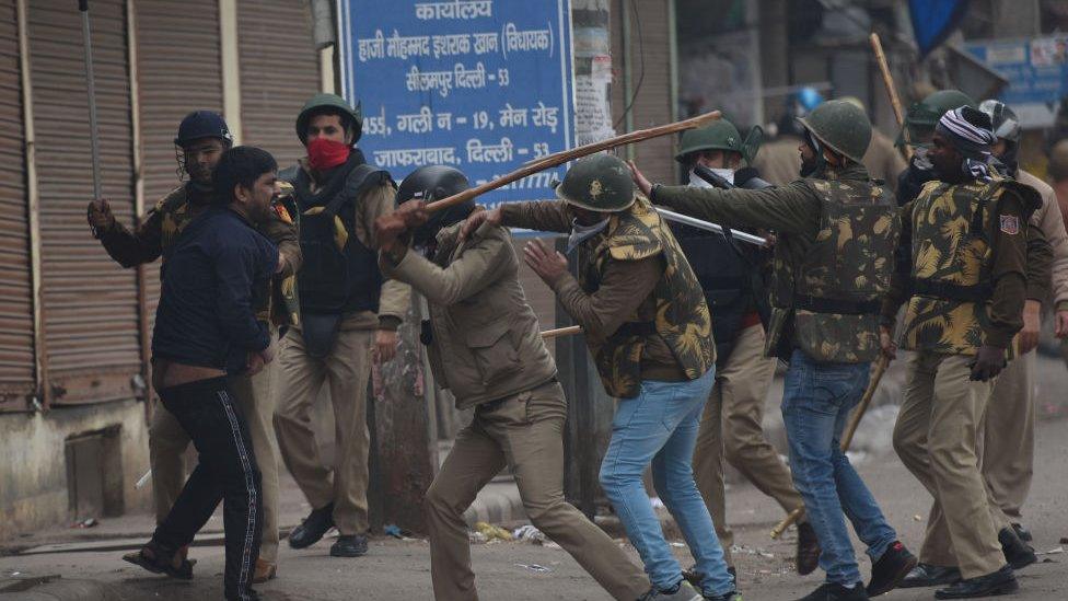 Police disperse a protest in Delhi