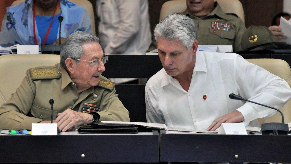 Picture taken on July 14, 2017 of Cuban President Raul Castro (L) and First Vice President Miguel Diaz-Canel talking during the Permanent Working Committees of the National Assembly of the People's Power.