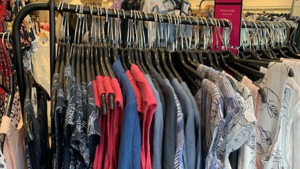 a rack of clothes in Leeds store