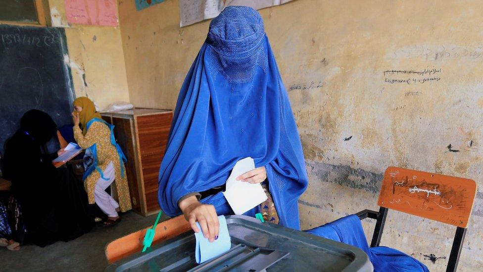 Woman casting her vote