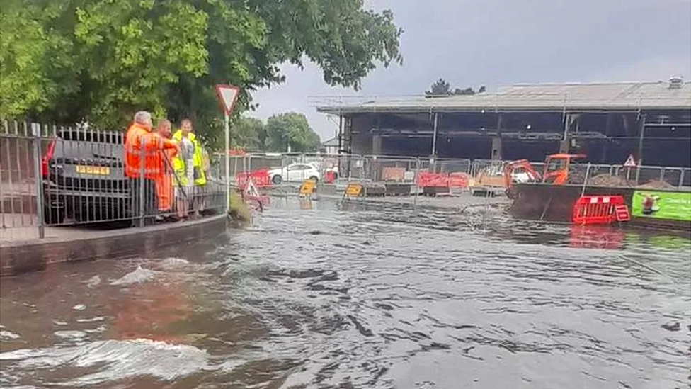 Flash flooding caused a spill of sewage onto roads and car parks in Totton, Hampshire