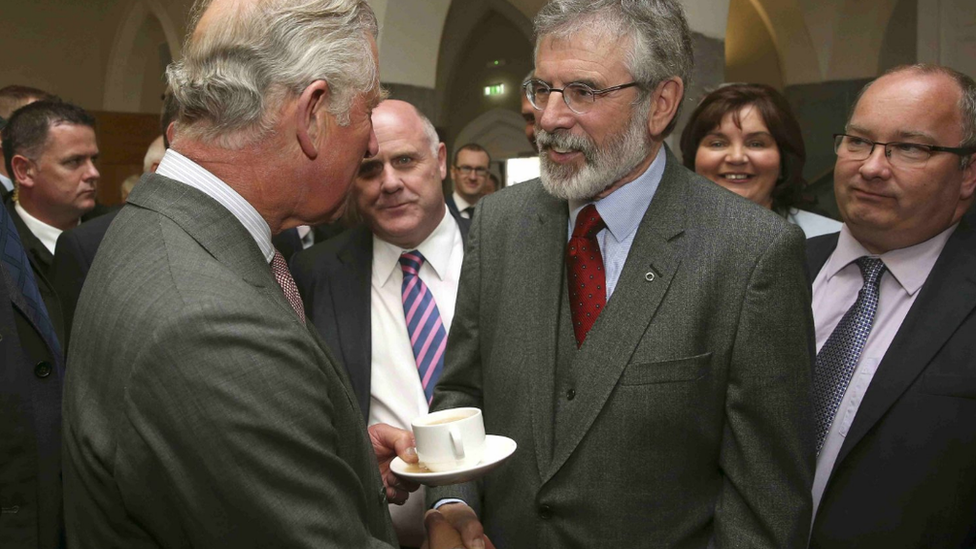 GALWAY, IRELAND - MAY 19: Prince Charles, Prince Of Wales shakes (shaking, handshake shake) hands with Sinn Fein president Gerry Adams at the National University of Ireland on May 19, 2015 in Galway, Ireland.