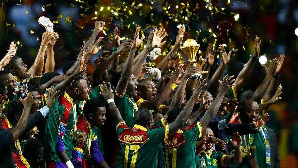 Cameroon players celebrate winning the continental trophy