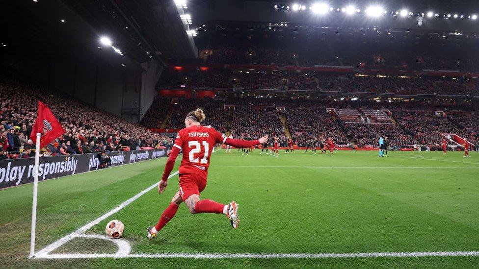 onstantinos Tsimikas of Liverpool FC takes a corner during the UEFA Europa League 2023/24 round of 16 second leg match between Liverpool FC and AC Sparta Praha.