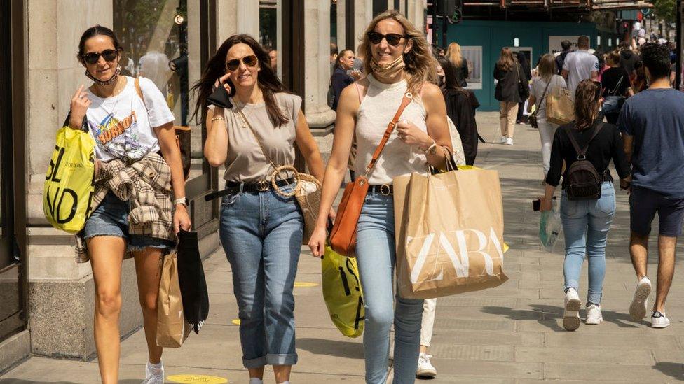 Shoppers on Oxford Street in July