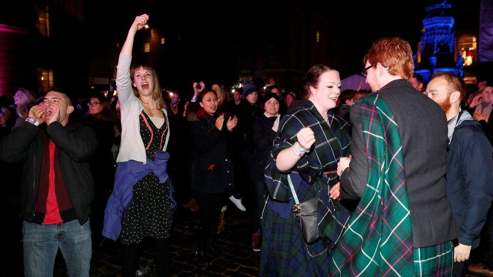 Hogmanay revellers dancing in Edinburgh