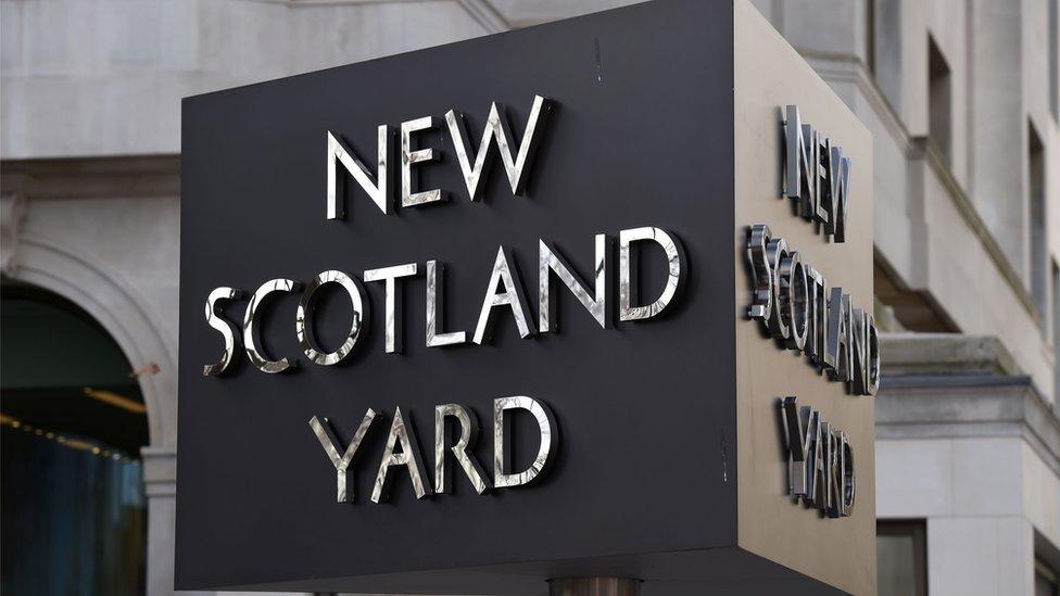 New Scotland Yard sign outside the Metropolitan Police headquarters in London