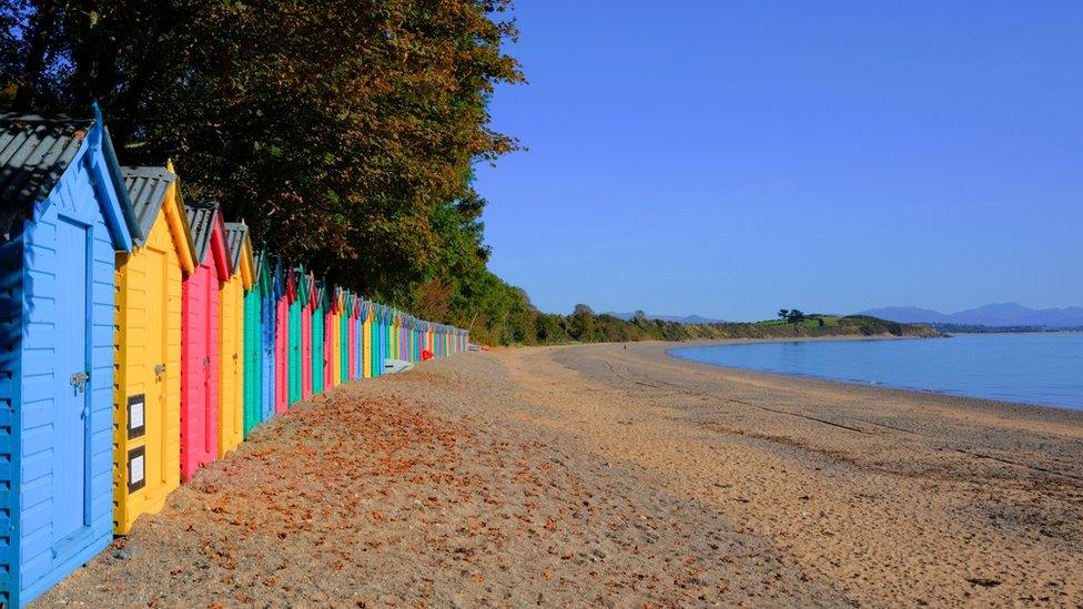 Colourful beach huts in Llanbedrog on the Llyn