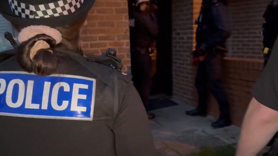 Merseyside Police carry out raids