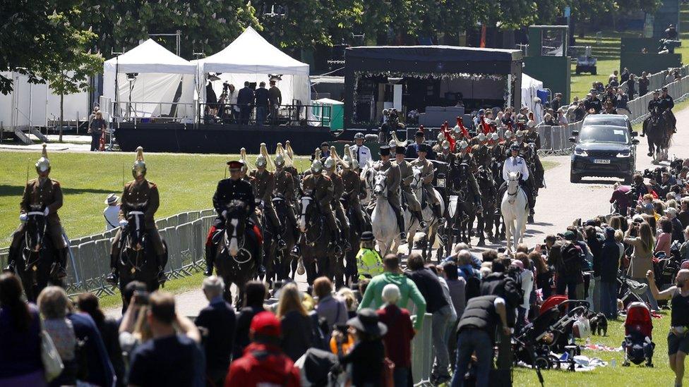 Members of the Household Cavalry Mounted Regiment escort the Ascot Landau carriage pulled by Windsor Grey horses, on the Long Walk during a rehearsal for the wedding procession