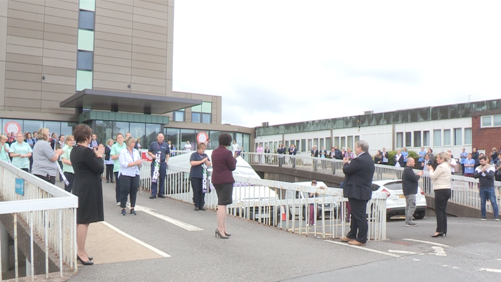 Arlene Foster and Michelle O'Neill stood with staff at South Tyrone Hospital in Dungannon