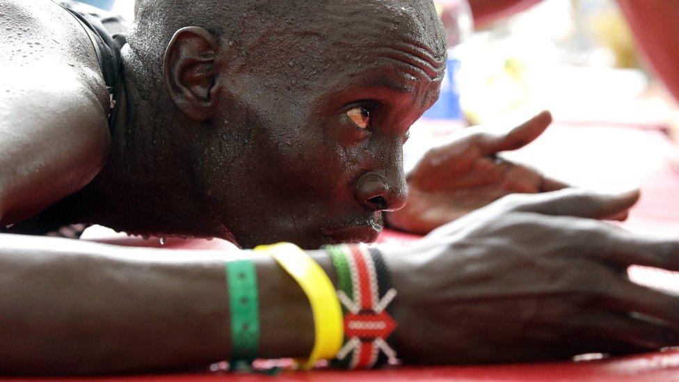 Kenyan athlete Abraham Kipton, reacts after winning the Lagos City Marathon, in Lagos, Nigeria - Saturday 11 February 2017