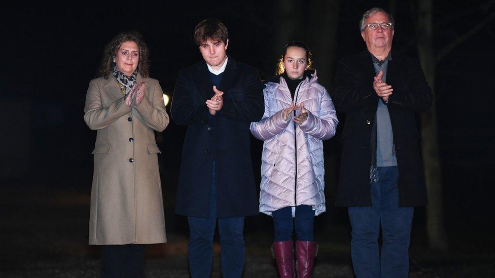 Captain Sir Tom Moore"s daughter Hannah Ingram-Moore, grandson Benji, granddaughter Georgia and son-in-law Colin Ingram outside his the home in Marston Moretaine