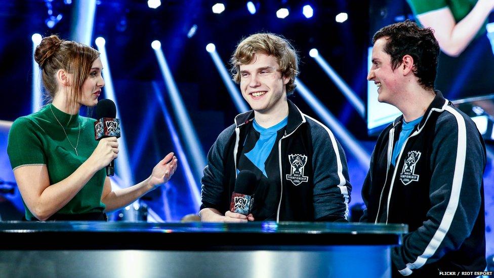 Members of team Origen get interviewed after booking their place in the quarter finals