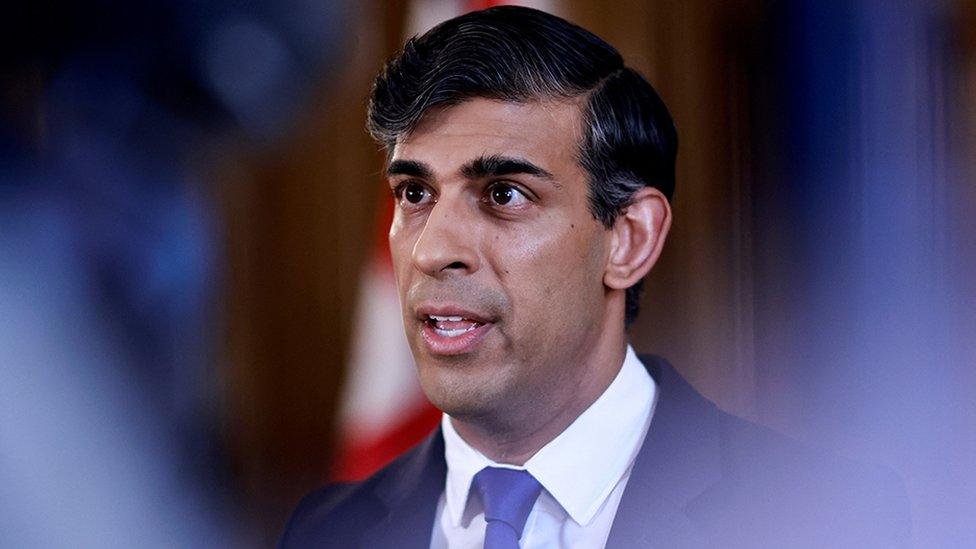 Rishi Sunak speaking inside Downing Street in London on 14 April