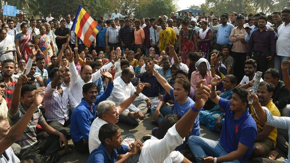 Protestors shout slogans as they block traffic in Mumbai during a protest on 3 January 2018.