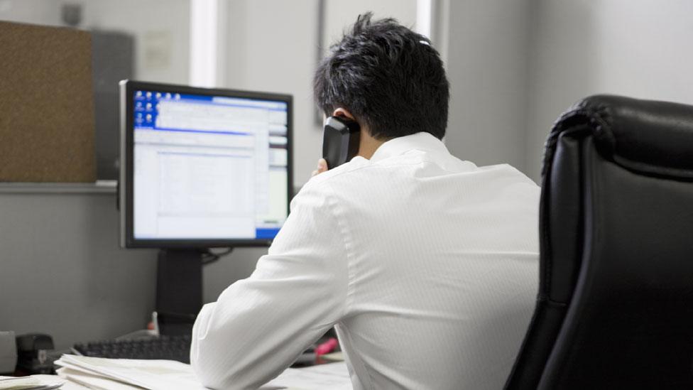 Worker at computer